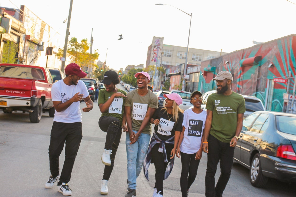 Young Black adults walking together — Make It Happen